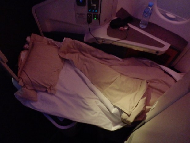 BUSINESS CLASS SEAT IN FLAT-BED POSITION